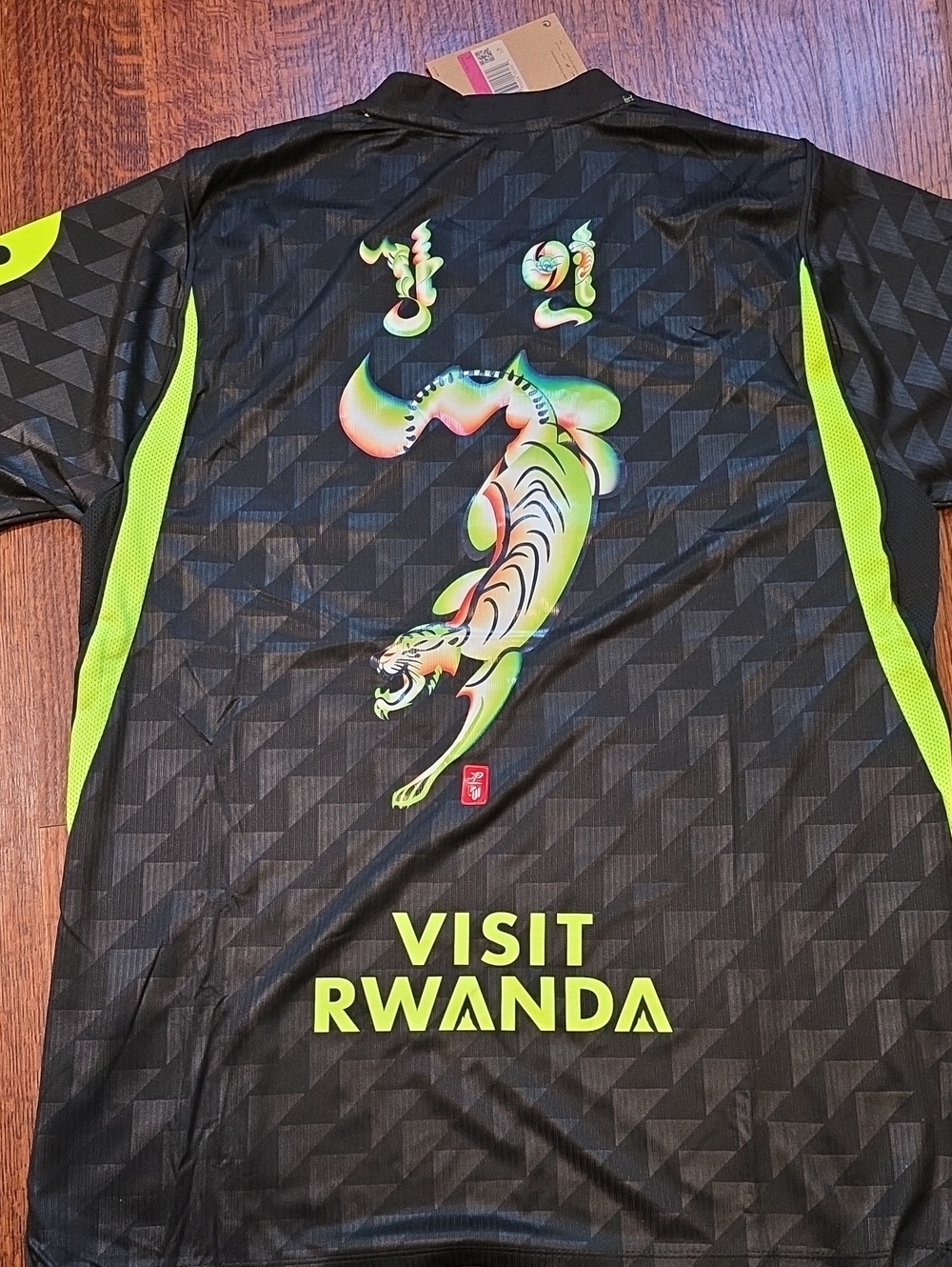 Visit Rwanda Kids' Black & Neon Yellow Soccer Top